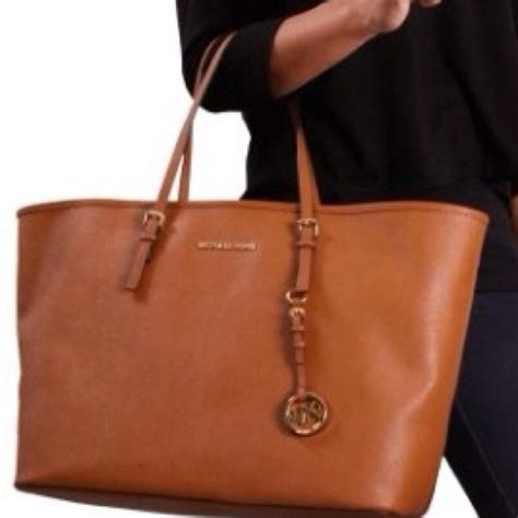 michael kors tote replacement.